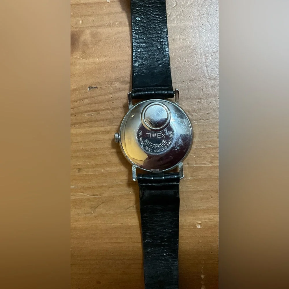 Timex: Men’s vintage (rare find) electromechanical wrist watch black wrist band.